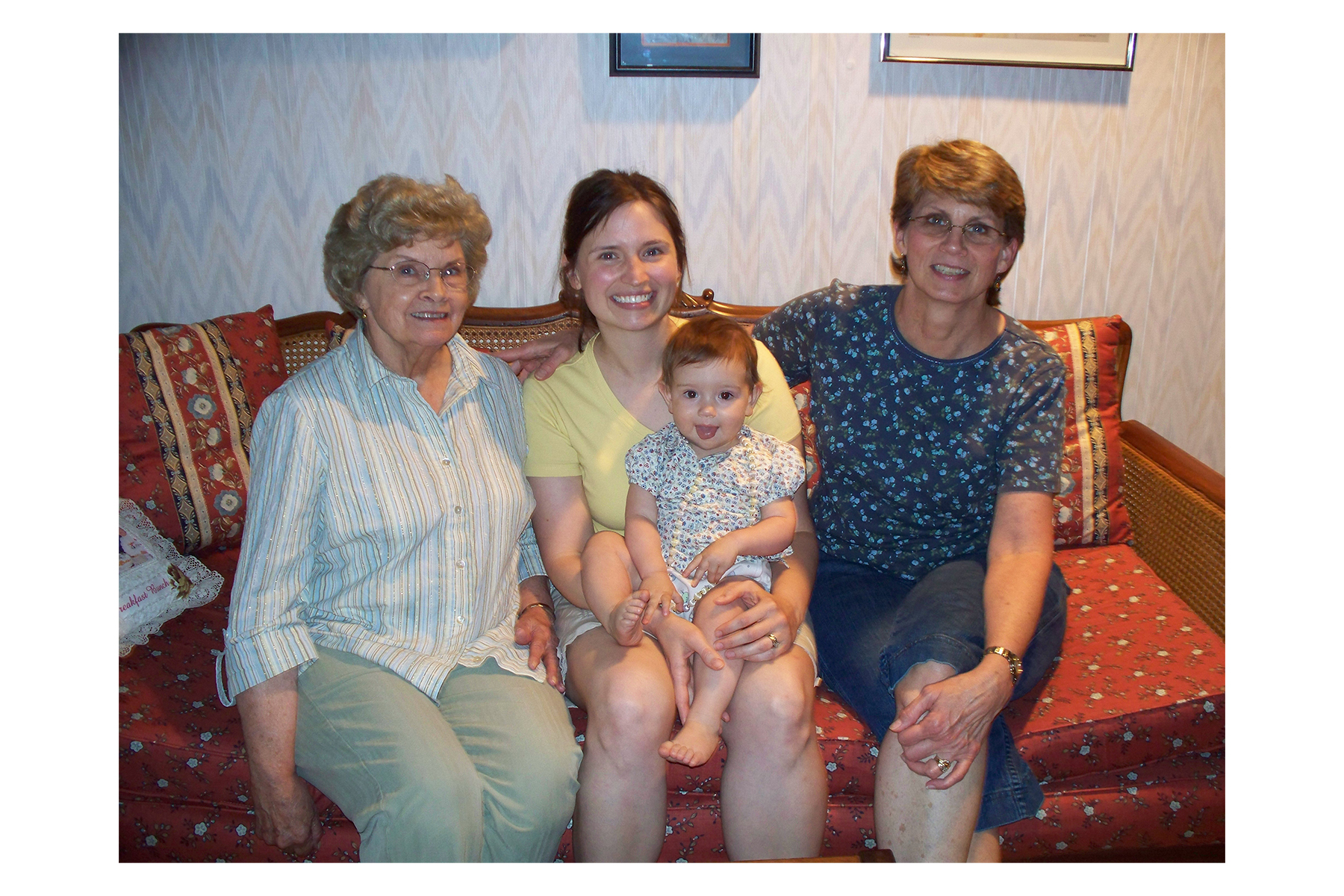 A group of people sitting posing for the camera