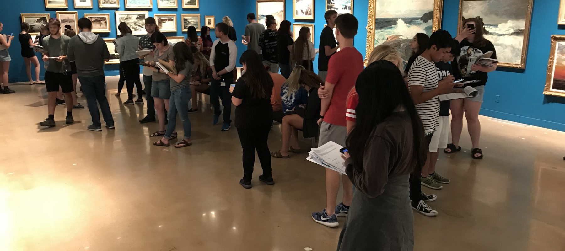 A group of people standing in a room