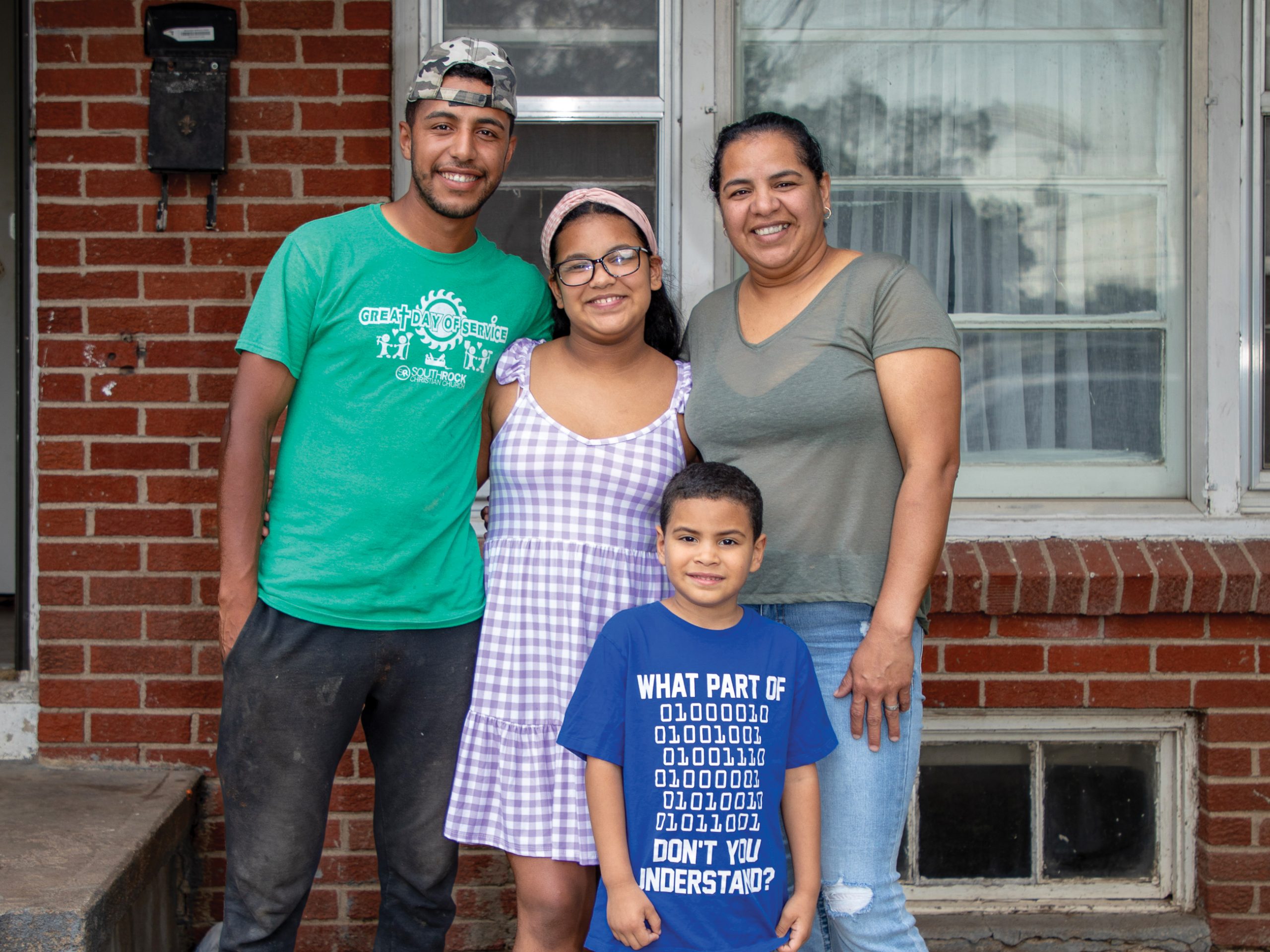 A young Venezuelan man, his sister, his mother and younger brother