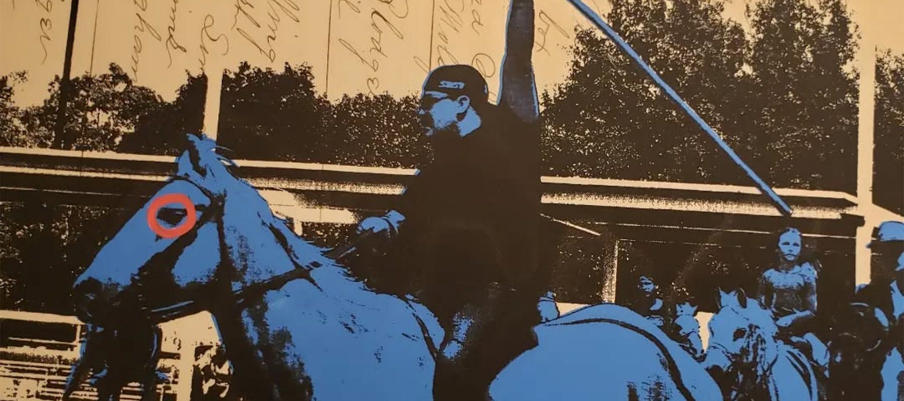 An modern indigenous man with a spear on a horse
